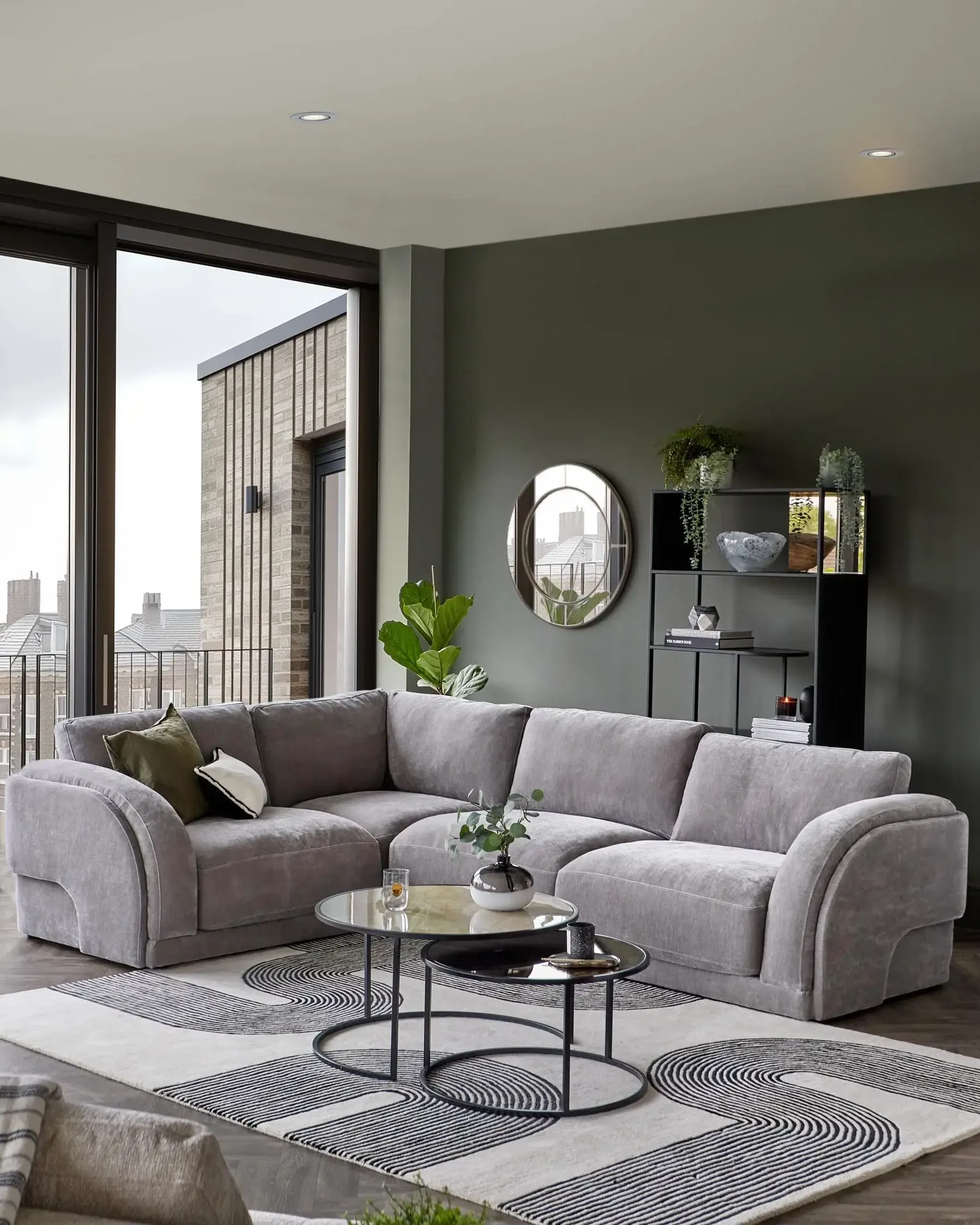 small-living-room-layout-with-corner-sectional-sofa-and-round-coffee-tables