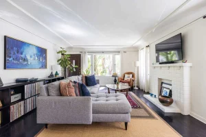 small-living-room-with-furniture-pushed-against-the-walls-creating-empty-center.