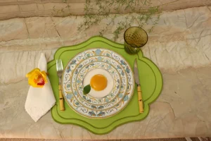 spring table setting ideas with neutral foundation and layered linens.