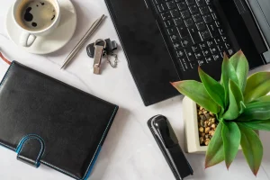 minimal home office desk with limited objects creating a clean and distraction free workspace