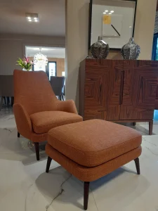 Herringbone-upholstered-armchair-adding-texture-and-visual-interest-to-a-contemporary-living-room