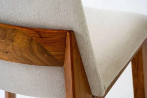 Close-up-of-well-crafted-dining-chairs-showing-quality-wood-upholstery-and-craftsmanship